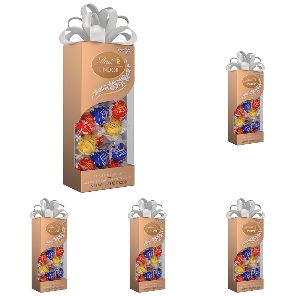 Lindt LINDOR Holiday Snickerdoodle White Chocolate Candy Truffles with Smooth, Melting Truffle Center, 8.5 oz. Bag