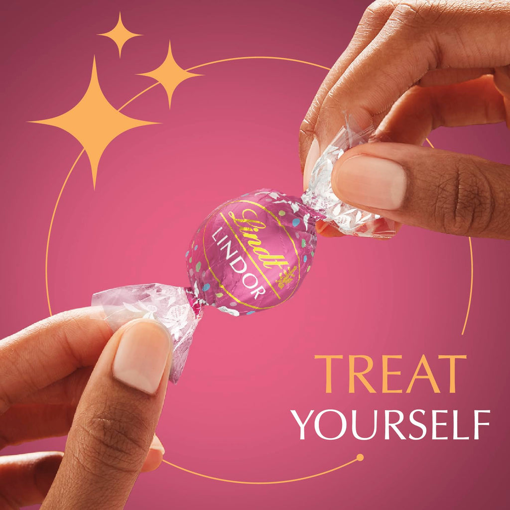 Lindt LINDOR Holiday Snickerdoodle White Chocolate Candy Truffles with Smooth, Melting Truffle Center, 8.5 oz. Bag