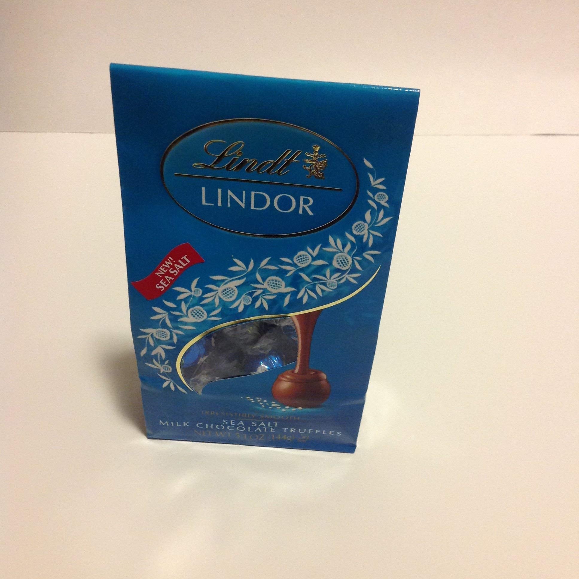 Lindt LINDOR Holiday Snickerdoodle White Chocolate Candy Truffles with Smooth, Melting Truffle Center, 8.5 oz. Bag