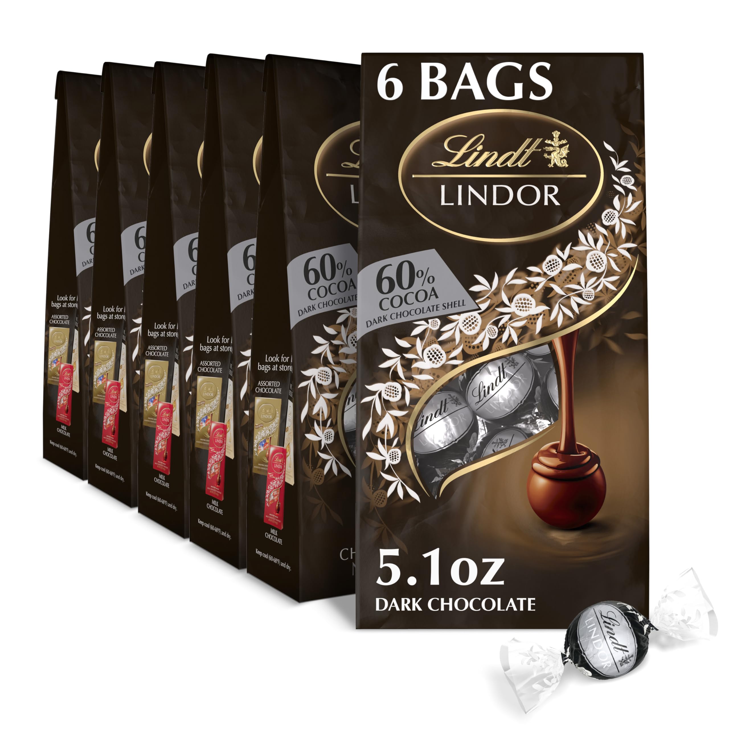 Lindt LINDOR Holiday Snickerdoodle White Chocolate Candy Truffles with Smooth, Melting Truffle Center, 8.5 oz. Bag