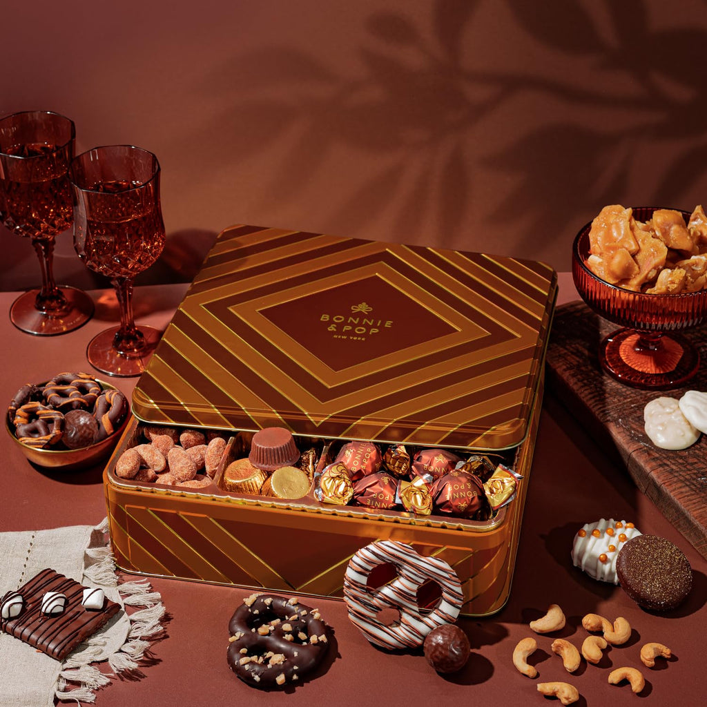 Caramels and Nut Sweet and Savory Gift Basket for Christmas Gifts, Dad, Men, Women, Holiday Parties | Gourmet Holiday Snack Tin Box | Churro Cinnamon and Sugar Pretzels | Sea Salt Caramels and Brittle| Prime Delivery Gift | Bonnie & Pop