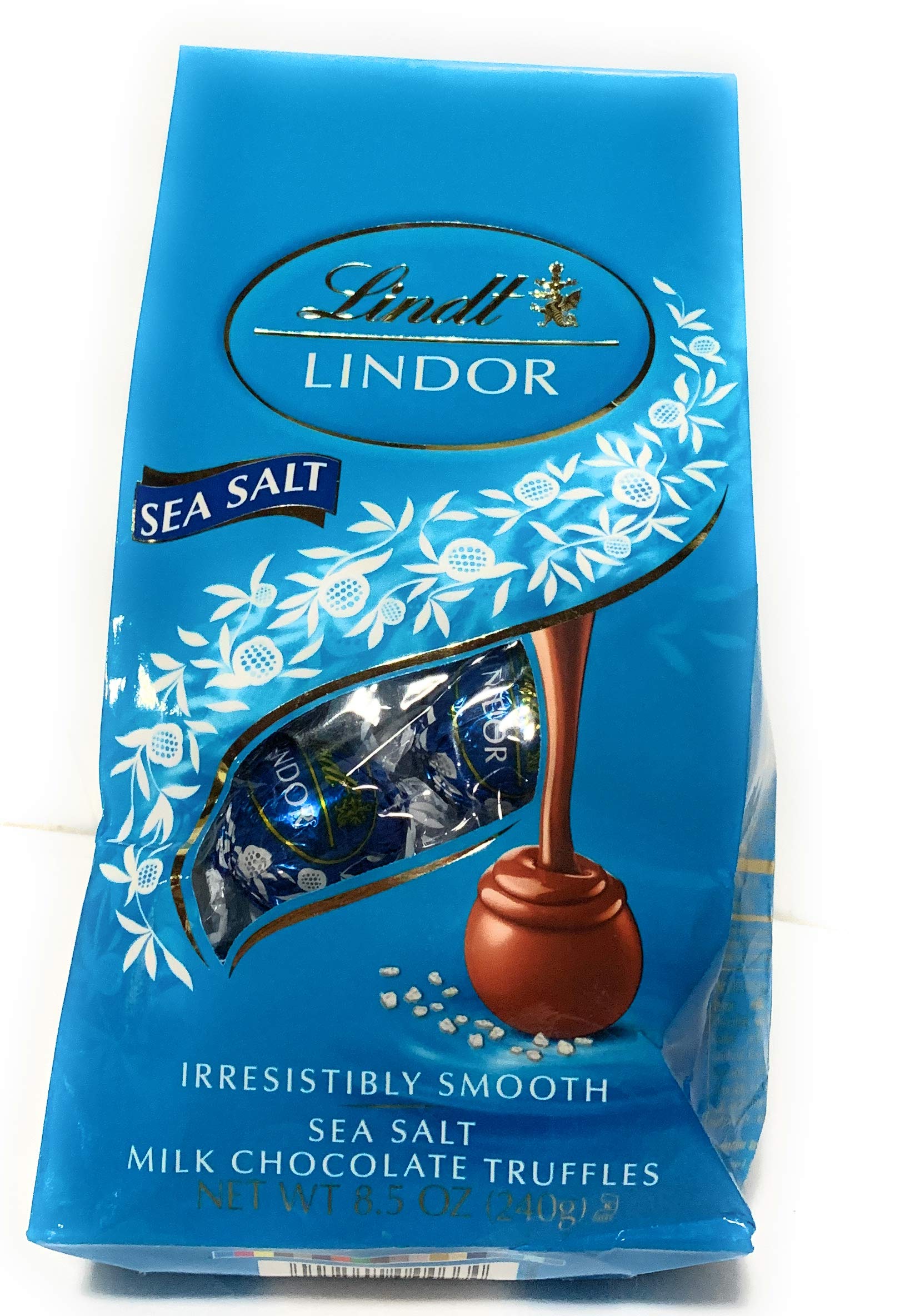 Lindt LINDOR Holiday Snickerdoodle White Chocolate Candy Truffles with Smooth, Melting Truffle Center, 8.5 oz. Bag