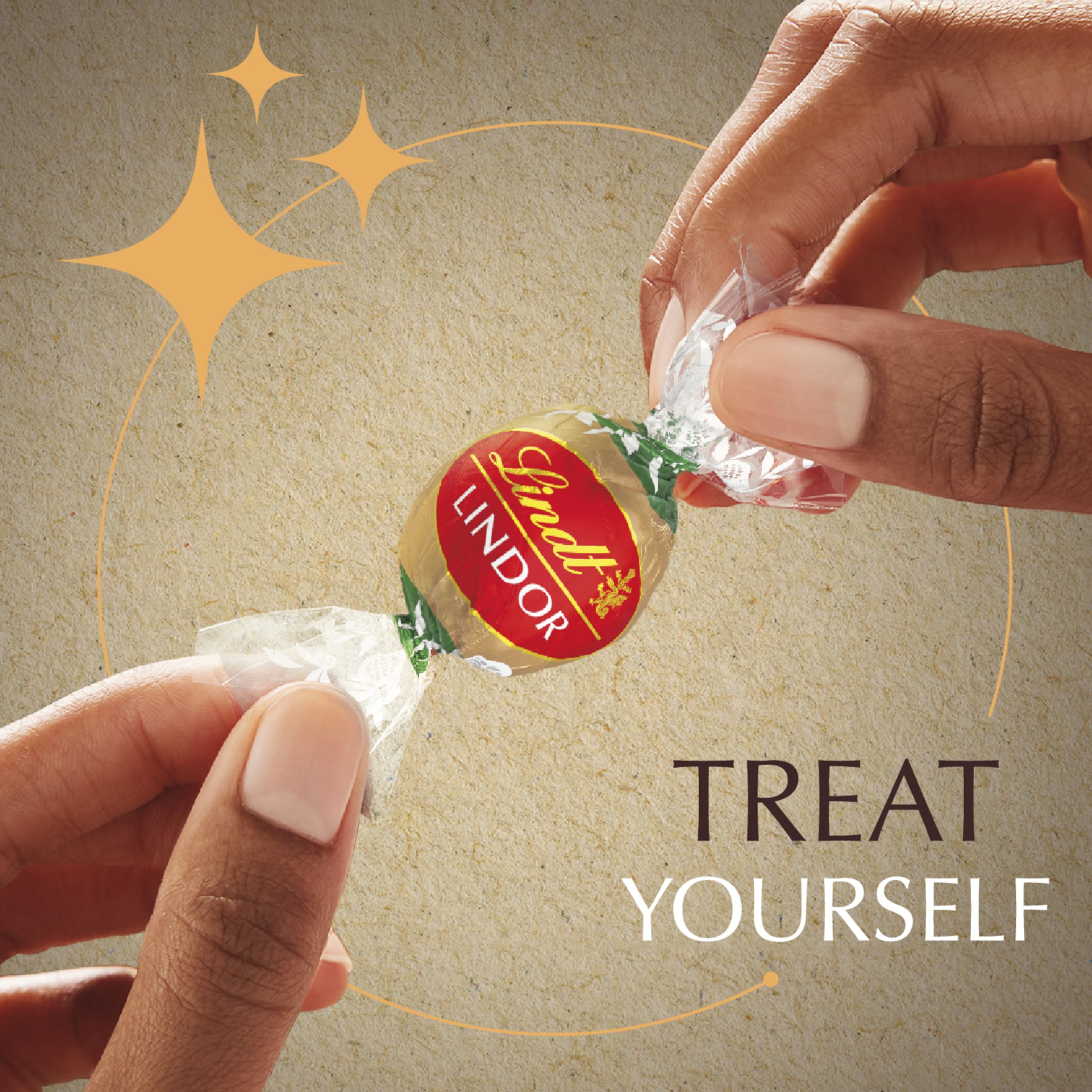 Lindt LINDOR Holiday Snickerdoodle White Chocolate Candy Truffles with Smooth, Melting Truffle Center, 8.5 oz. Bag